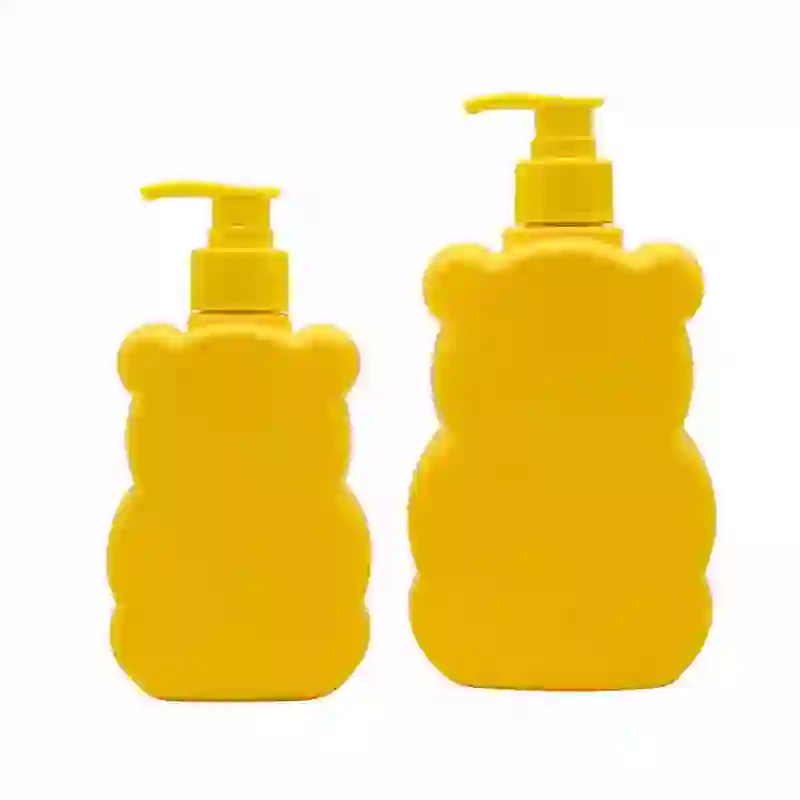 front view of bulk 300ml and 500ml yellow plastic bear bottles with lotion pump closures, eco-friendly HDPE packaging containers for baby wash and children toiletries.