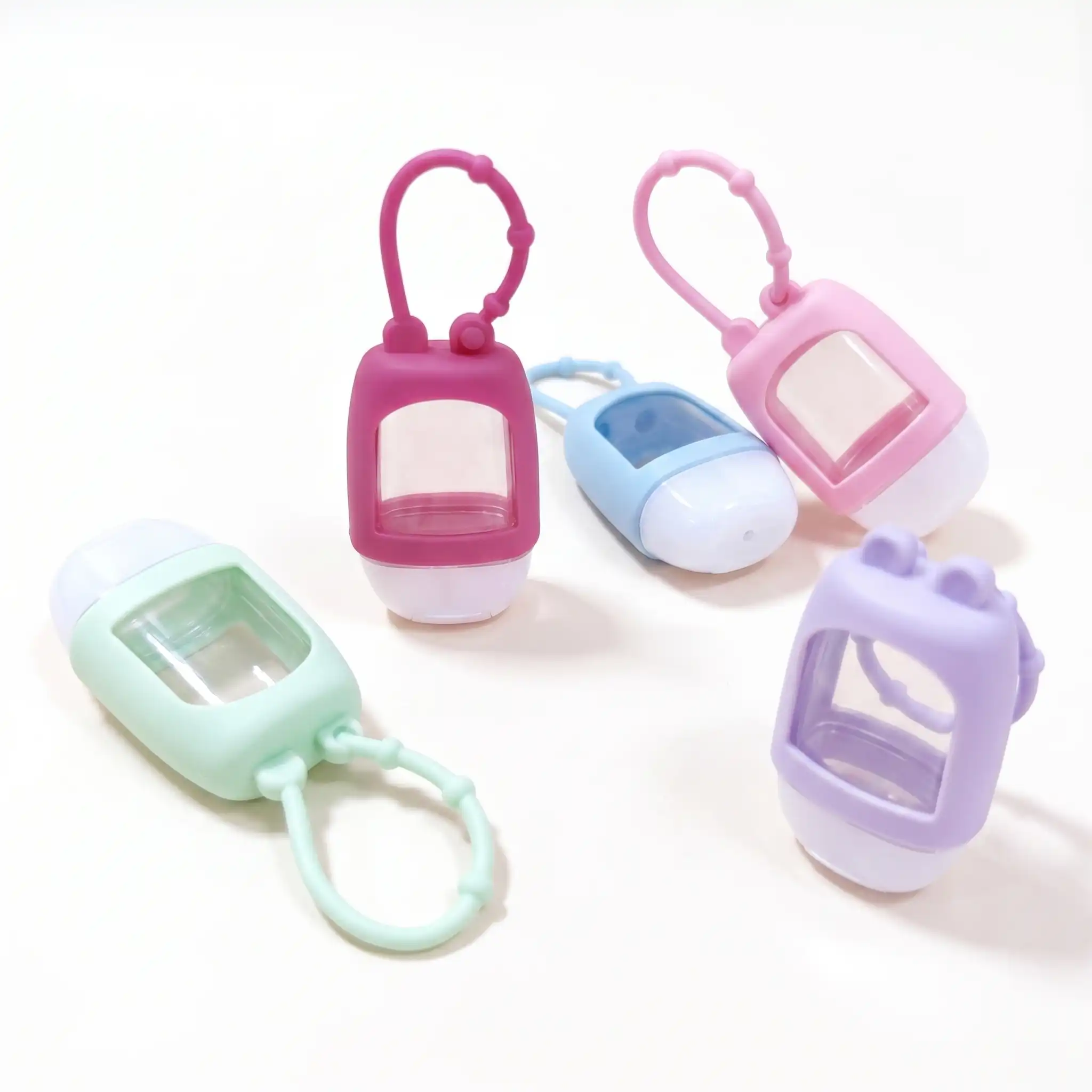 multi-color 30ml refillable hand sanitizer bottles with silicone keychain holders, portable travel size squeeze bottles for kids and adults